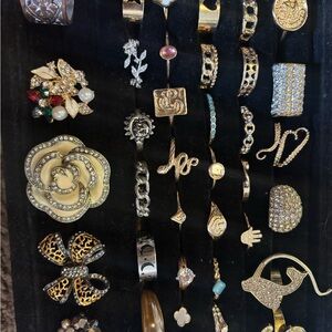 36 assorted different sizes gold and silver like rings